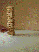 GIF of a Jenga tower collapsing, over and over again.